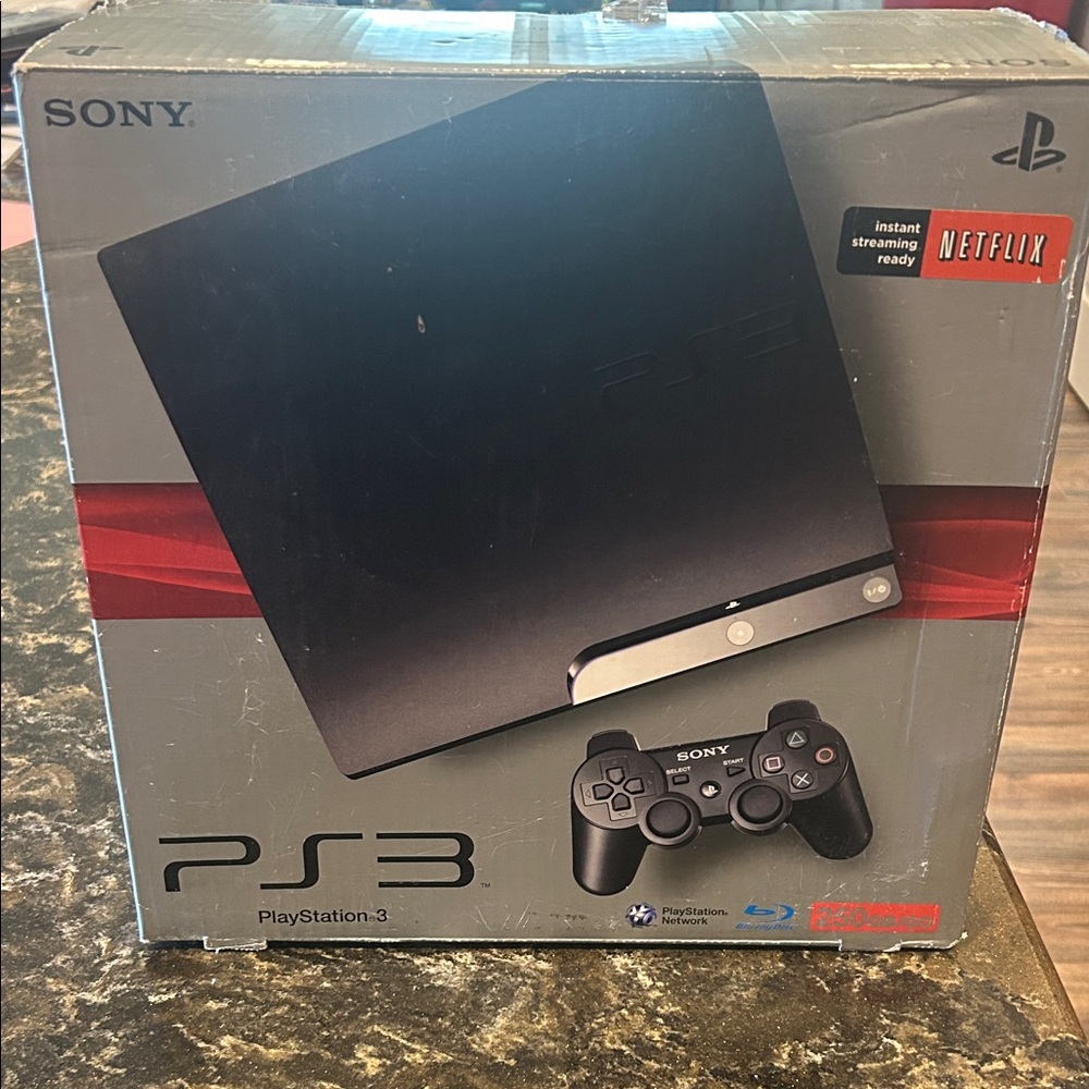 Sony PS3 Console and 2 Controllers- Black + PS3 remote